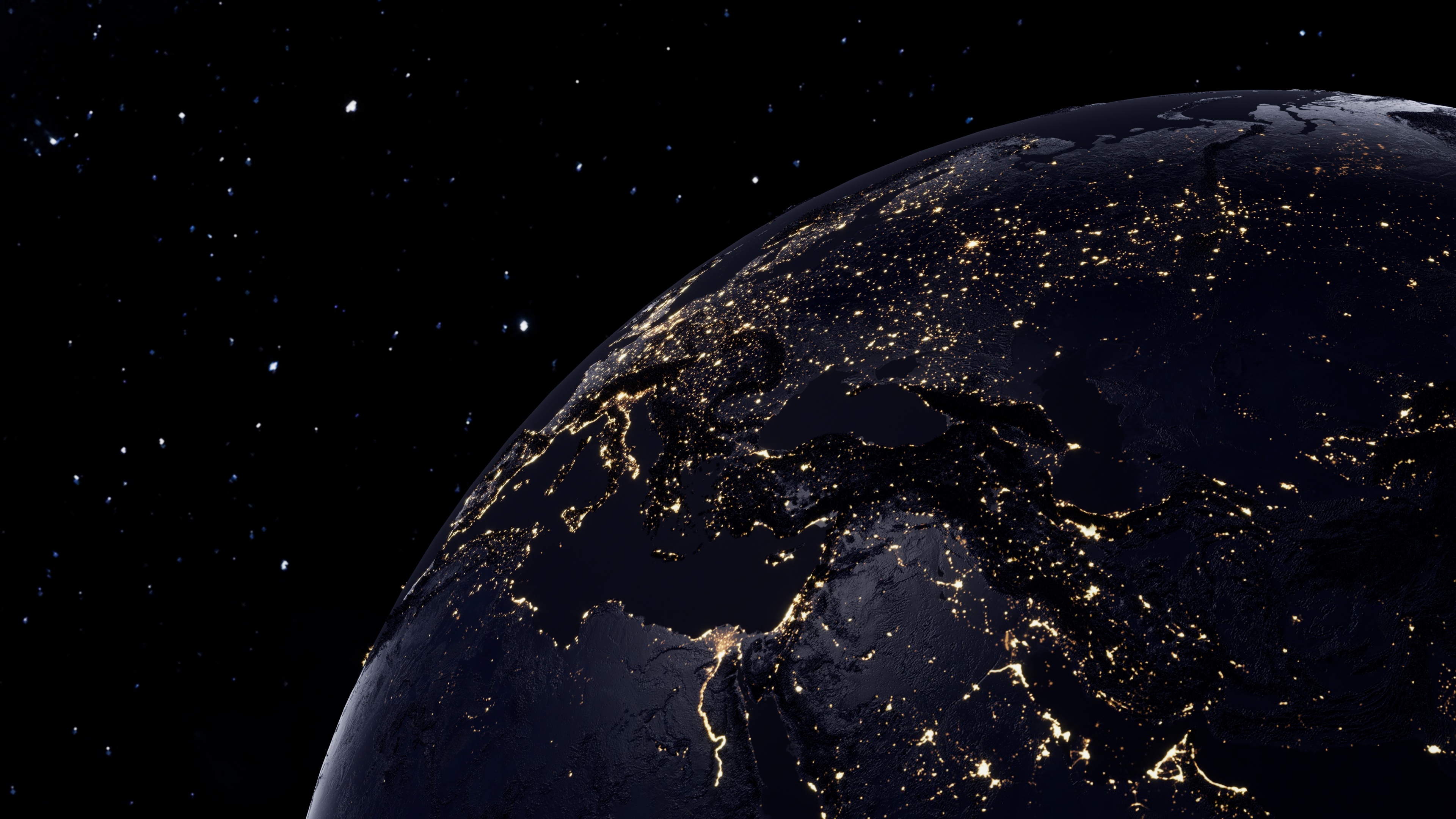 Earth from orbit showing city lights against dark space background